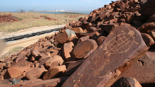 Aboriginal rock art, or petroglyph of a sea turtle on the Burrup Peninsula.