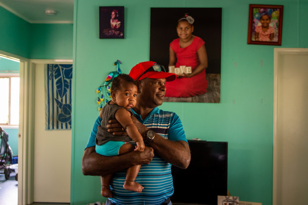 Pabai with his grandson Chad at their home on Boigu Island.
