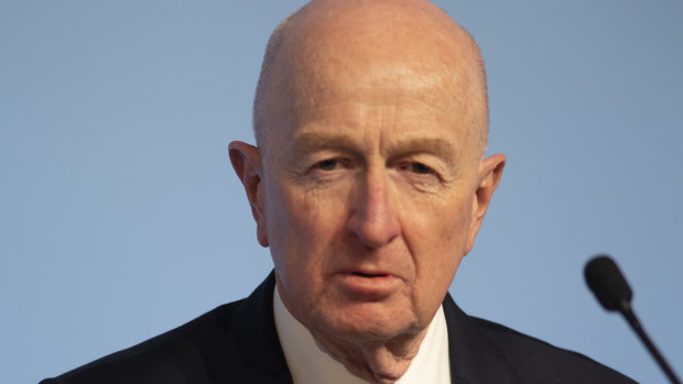 Macquarie chair Glenn Stevens warns on inflation as profits take a hit
