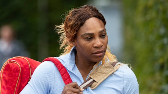 Serena Williams arrives for a practice session at the All England Club.