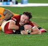 Hugo Keenan of the British & Irish Lions scores the winning try during the second test of the series between Australia Wallabies and British & Irish Lions at the Melbourne Cricket Ground