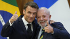 Brazilian President Luiz Inacio Lula da Silva, right, and France’s President Emmanuel Macron pose for photos at Planalto presidential palace in Brasilia.