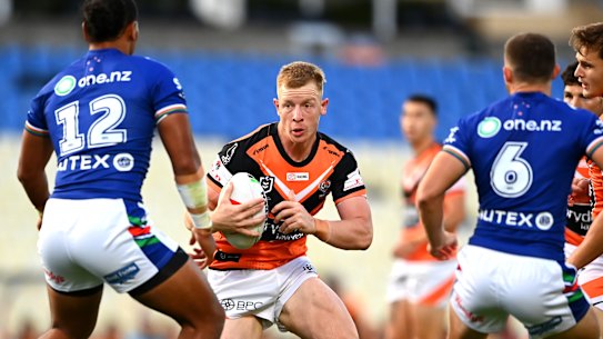 Alex Seyfarth of the Tigers charges forward during the NRL trial match between New Zealand Warriors and Wests Tigers at Mt Smart Stadium.