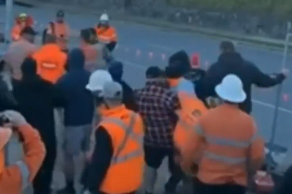 CFMEU workers block people from accessing a Cross River Rail site on Wednesday.