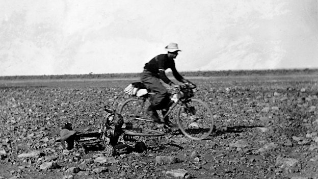 Jack Fahey rides across gibber plains between Adelaide and Darwin during his record attempt in 1914 with Ted “Ryko” Reichenbach.