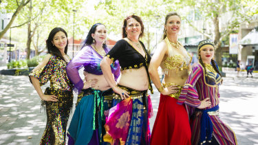 Belly dancers Yukon Okayama, Victoria Leader, Fran Gray, Brooke Thomas and Danika Bertoz prepare for the 2019 National Multicultural Festival. 