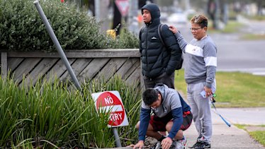 Veni Atonio (centre) at the scene of the fatal attack on Wednesday morning.