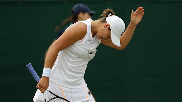 Australia's Ashleigh Barty gestures after missing a point.