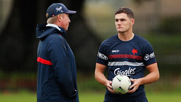 Kyle Flanagan and Roosters coach Trent Robinson chat at training early in the 2020 season before things turned sour.
