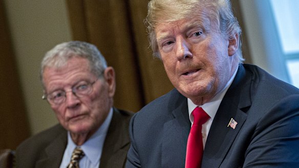 Senator James Inhofe (left) was chopping wood with his grandson in Oklahoma when Trump called from Air Force One.