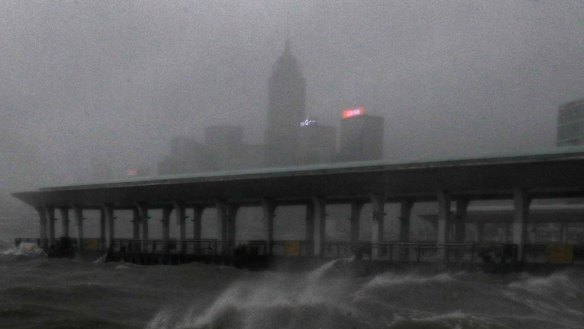 Strong wind caused by Typhoon Mangkhut churns waves on the waterfront of Victoria Habour Hong Kong.