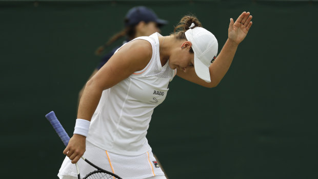 Australia's Ashleigh Barty gestures after missing a point.