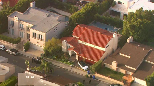 This aerial photo taken from video provided by Fox11 News KTTV-TV shows the Hollywood Hills home where Pop Smoke was shot and killed.
