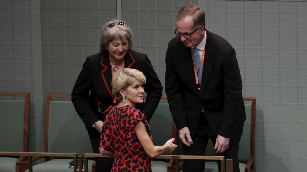 Liberal MP Julie Bishop greets UK High Commissioner to Australia Vicki Treadell and US Ambassador to Australia Arthur B Culvahouse Jr during question time. 