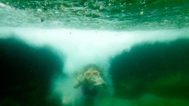 Summer McGuiggan, 7, swimming at Wylie's Baths, Coogee. 