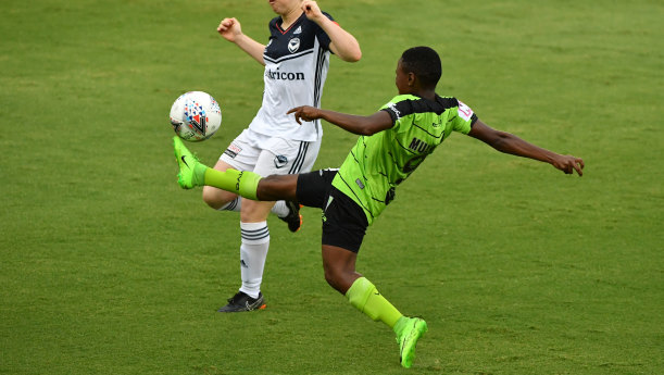 Canberra's Rhoda Mulaudzi and Victory's Teigan Allen in action at McKellar Park on Tuesday night. 