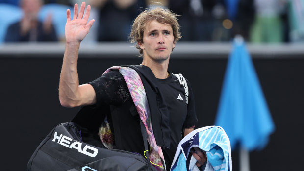 Alexander Zverev thanks the crowd on his way out of Melbourne Park following a loss in the second round.
