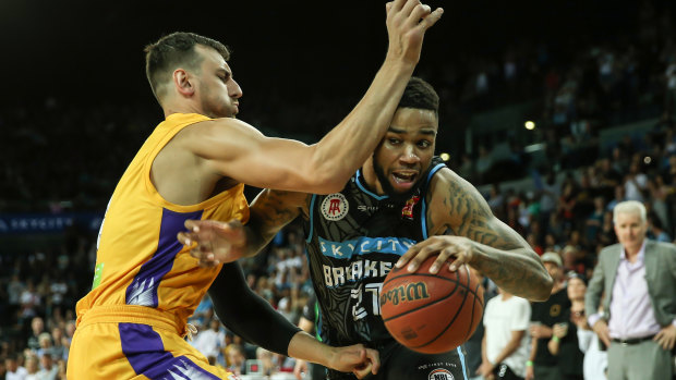 Shawn Long in action against Andrew Bogut last year.