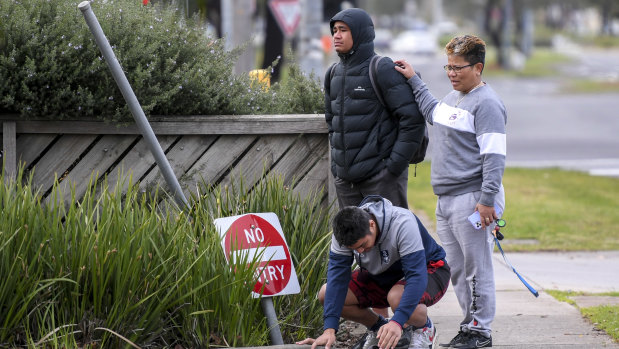 Veni Atonio (centre) at the scene of the fatal attack on Wednesday morning.