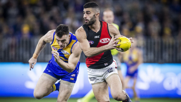 Speedster: Adam Saad breaks away from West Coast's Luke Shuey during the Bombers' win over the Eagles in Perth.