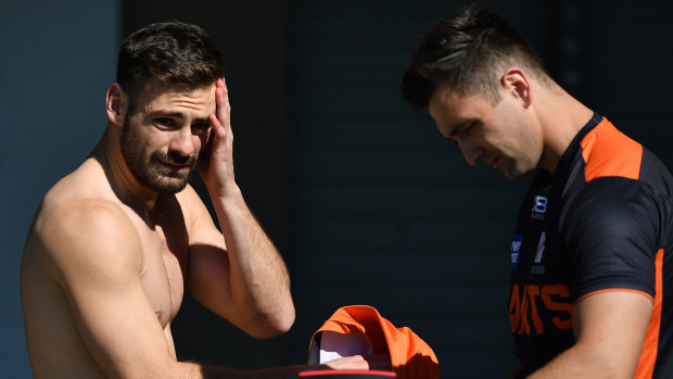 Free agent Stephen Coniglio (left) at Giants training this week. 