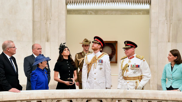 Prince Harry and Meghan view the Hall of Memory with NSW Governor David Hurley.