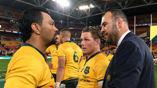 Throwback: Michael Cheika congratulates Kurtley Beale for the win over South Africa – but perhaps not for his mullet.