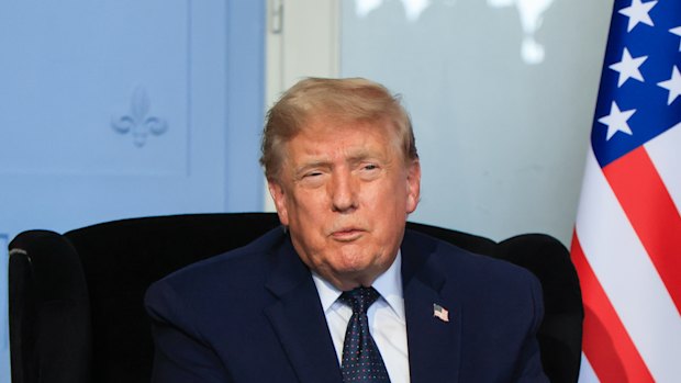 Donald Trump, attending the G7 in Evian, France said it was unlikely he would stay in Europe to sign the peace deal.