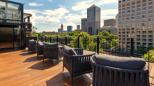 City skyline views from the rooftop lounge area at 202 Elizabeth.