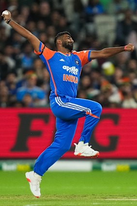 Jasprit Bumrah of India bowling at the MCG.