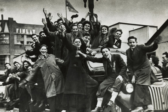 Trucks carry workers into Melbourne to celebrate.