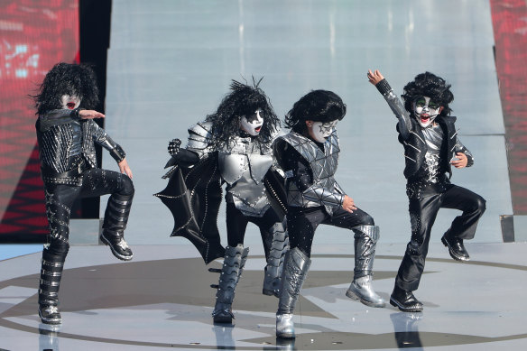 Some junior conscripts in the KISS army. Hundreds of young dancers joined the band on the pitch for the finale of its three-song set. 