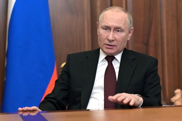 Russian President Vladimir Putin addresses the nation in the Kremlin.