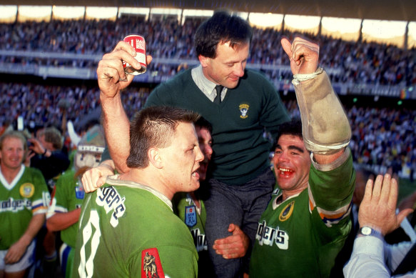 Tim Sheens is hoisted aloft by Glenn Lazarus and Mal Meninga after the 1989 grand final.