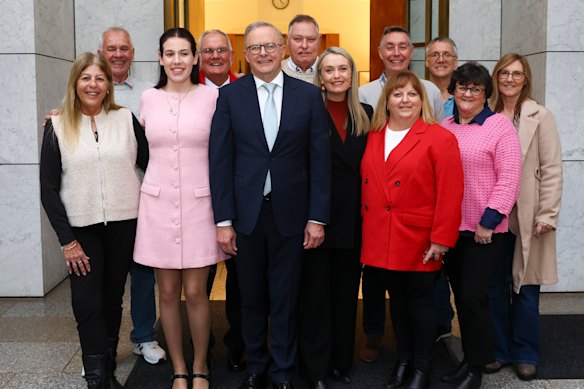 Prime Minister Anthony Albanese and Jodie Haydon with the “Campo crew” on Tuesday, the opening day of the 48th parliament.