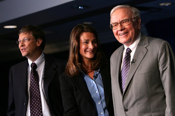 Melinda French Gates in 2006 with then husband Bill, left, and Warren Buffett, who has called her “smarter” than Bill.