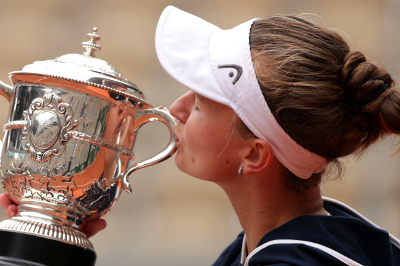 Match winner Barbora Krejcikova of Czech Republic kisses the winners trophy after her win. 