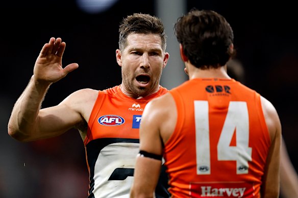 The two Tobies: Greene (left) and Bedford celebrate the Giants’ stunning win over Geelong.