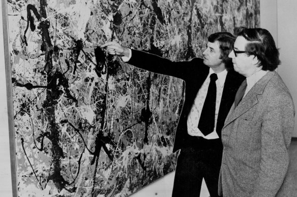 Mollison looking at Blue Poles with NSW Art Gallery director Peter Laverty in 1974.