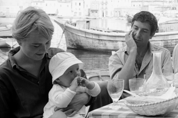 Leonard Cohen with Marianne Ihlen and her son, Axel Jensen, on Hydra in October 1960. 