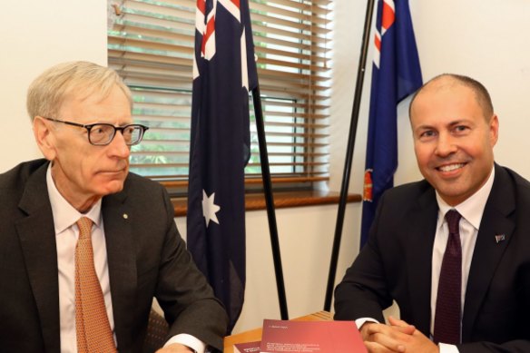 Commissioner Kenneth Hayne submits to Treasurer Josh Frydenberg the final report from the Royal Commission into Misconduct in the Banking, Superannuation and Financial Services Industry on Friday.