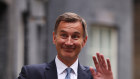 UK treasurer Jeremy Hunt resisted calls for big tax cuts now to ease the heaviest tax burden on the economy since World War Two.