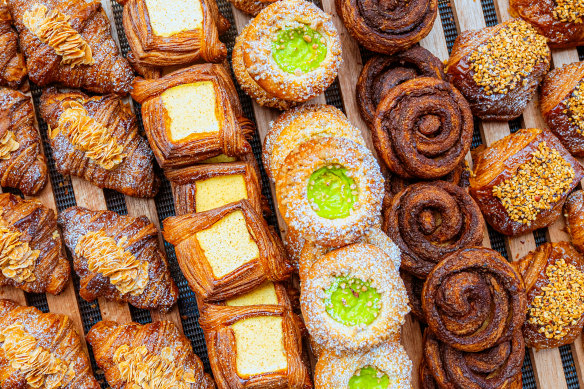 Mandarin and macadamia croissants, custard tarts, pandan coconut brioche and Vegemite avocado and chilli scrolls, at Shadow Baking. 