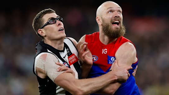 MELBOURNE, AUSTRALIA - SEPTEMBER 07: Mason Cox of the Magpies and Max Gawn of the Demons compete in a ruck contest during the 2023 AFL First Qualifying Final match between the Collingwood Magpies and the Melbourne Demons at Melbourne Cricket Ground on September 07, 2023 in Melbourne, Australia. (Photo by Dylan Burns/AFL Photos via Getty Images)