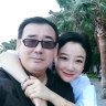Yang Hengjun pictured with his wife in 2017.