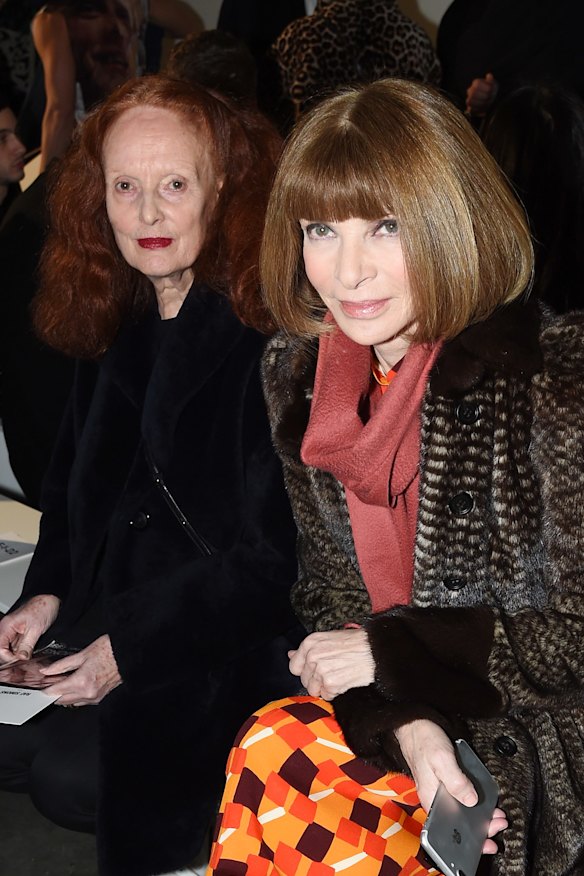 American Vogue creative director at large and long-time friend and collaborator Grace Coddington and Anna Wintour at a Raf Simons show in New York (2017). 