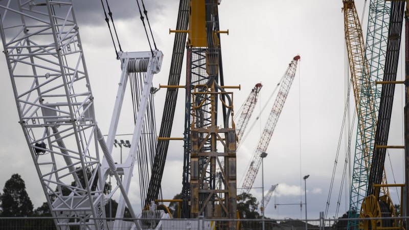 Infrastructure cranes hit record, housing slumps