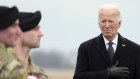 President Joe Biden watches as an Army team returns the remains of one of those killed in Jordan.