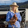 Kristen McLennan at her free-range chicken farm in Kangaroo Valley with filmmaker Ian Darling, whose documentary on silence and solitude a rural community will premiere at the Sydney Film Festival in June.
