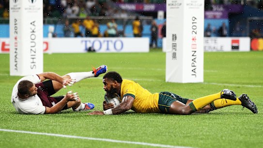 Marika Koroibete crosses the line in Australia's 27-8 win over Georgia in Shizuoka. 